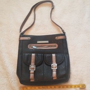 Damsel in defense black and bronze purse